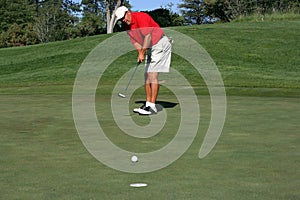 Man about to make putt