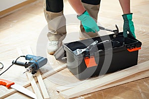 Man with toolbox during renovation