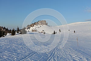 Man on top as silhouette in mountain