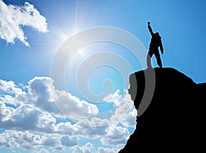 Man on top of mountain