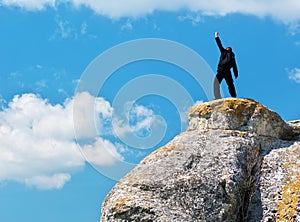 Man on top of mountain