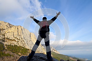 Man on top of the mountain