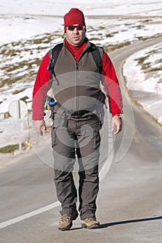 Man in the top of a in mountain hiking