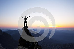 Man on the top of the rock