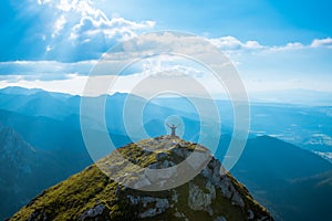 Man on the top of a rock