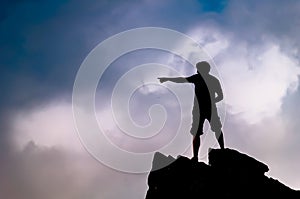 Man on top of rocks on Little Stony Man Mountain in Shenandoah National Park photo