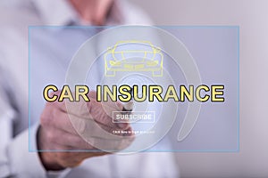 Man touching a car insurance concept on a touch screen
