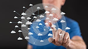 Man touching a cloud network concept