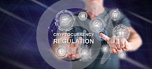 Man touching a cryptocurrency regulation concept