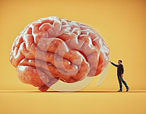 Man touching a huge human brain. Mental capacity, cognitive processing, and human interaction