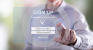 Man touching a signup concept on a touch screen