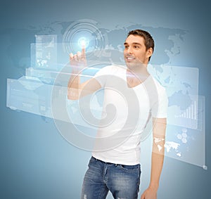 Man touching virtual screen