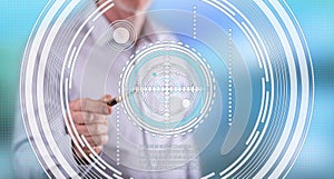 Man touching a virtual technology concept on a touch screen