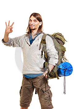 Man tourist backpacker showing ok gesture. Travel.