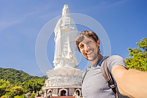 Man tourist in Chua Linh Ung Bai But Temple, Lady Buddha Temple in Da Nang, Vietnam