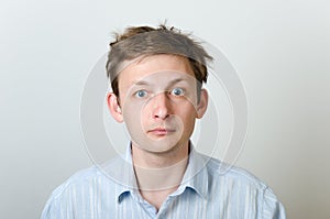 Man with tousled hair