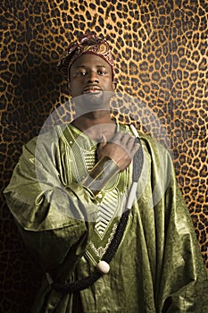 Man in traditional African clothing.