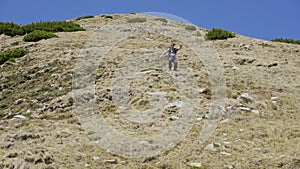 Man trail running downhill