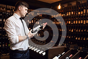 Man is trained in wine tasting, pairing wine with foods, wine purchasing