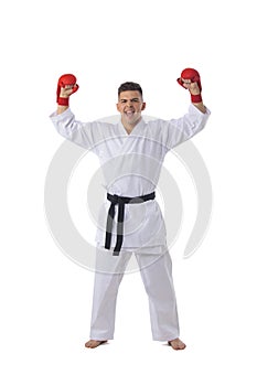 Man training taekwondo on white