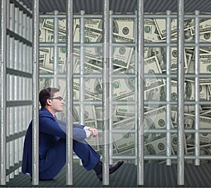 Man trapped in prison with dollars