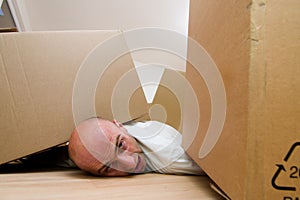 Man trapped under boxes