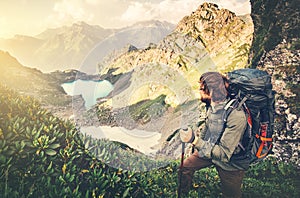 Man Traveler with backpack mountaineering