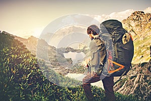 Man Traveler with big backpack mountaineering Travel Lifestyle concept