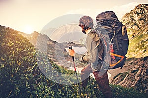 Man Traveler with big backpack mountaineering Travel Lifestyle concept photo