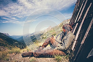 Man Traveler with navigator tracker relaxing alone