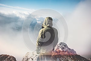 Man Traveler standing on mountain summit