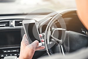 Man traveler Using Smart Phone at Car Inside