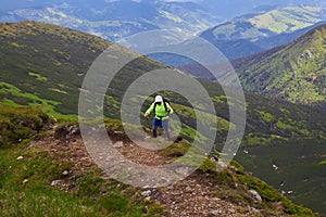 Man traveling with backpack hiking in mountains Travel Lifestyle success concept adventure active vacations outdoor