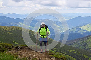 Man traveling with backpack hiking in mountains Travel Lifestyle success concept adventure active vacations outdoor