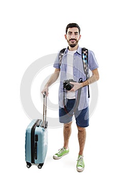 Man traveling with luggage and camera