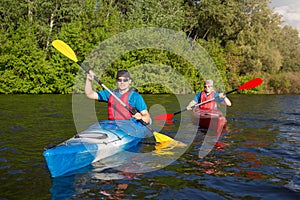 Man traveling on the river in a kayak
