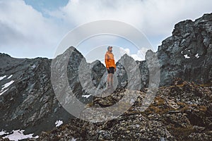 Man trekking alone in mountains travel hiking adventure outdoor