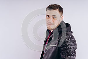 Man in trendy jacket on white background