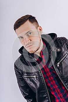 Man in trendy jacket on white background