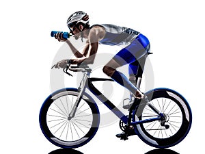 Man triathlon iron man athlete cyclist bicycling drinking photo