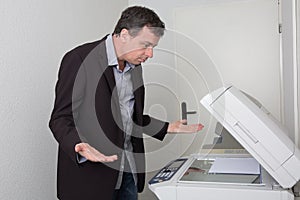 Man in trouble with the copy machine