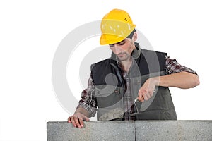 Man with trowel and cement