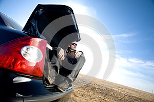 Man in trunk of car