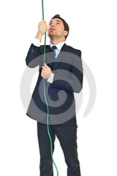 Man trying to climbing rope