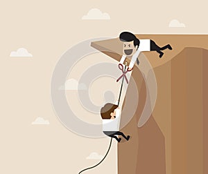 Man trying to cut climbing rope