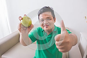 Man trying to eat healthy fresh food