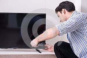 The man trying to fix broken tv