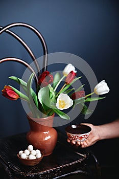 Man with tulips, kurt and Kazakh tea on Nauryz festival photo