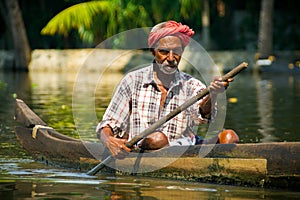 Man in Turban Through Kerala Backwaters