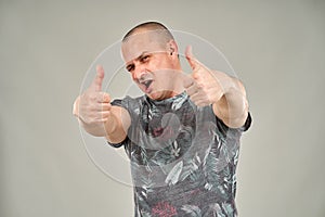 Man with two thumbs up